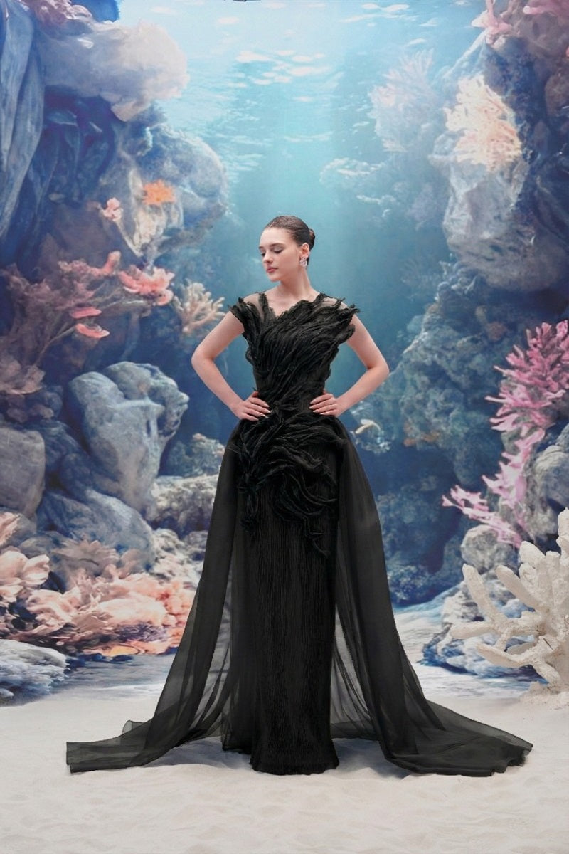 Black Sedna tulle and organza gown by 21Six featuring a flowing silhouette and elegant design.