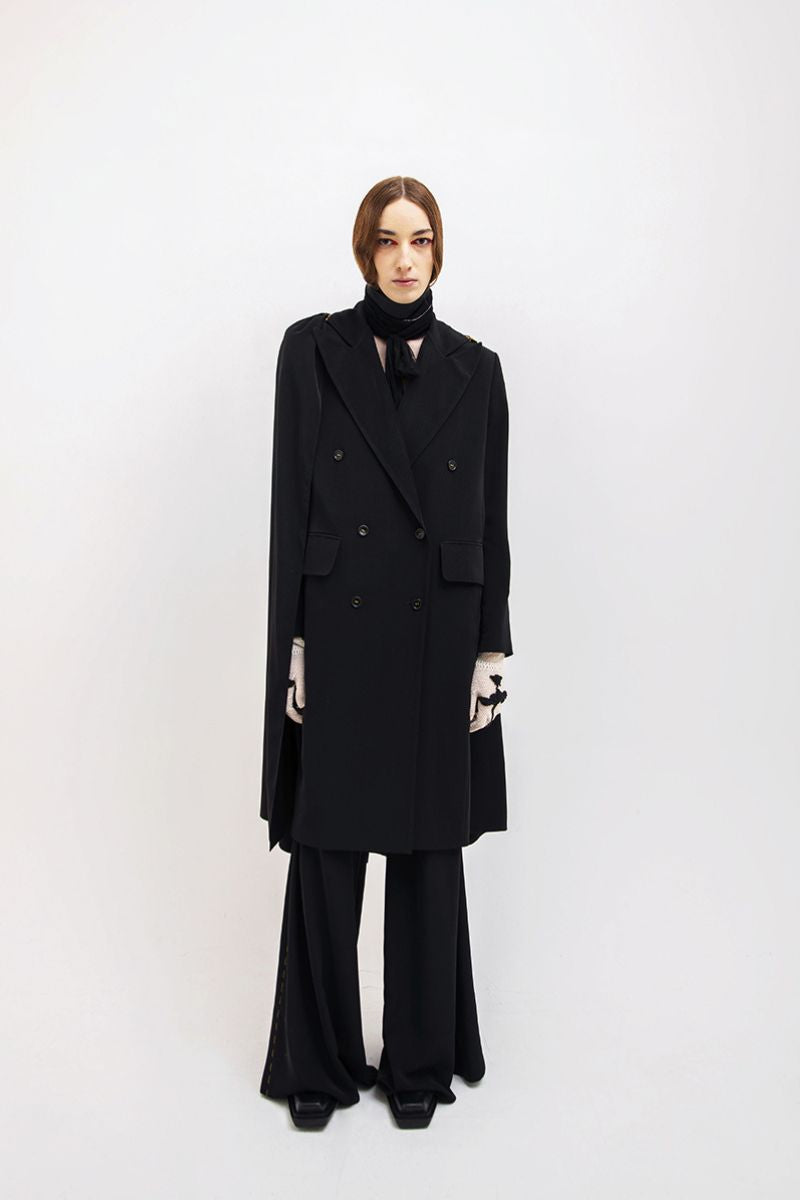 Black Vaska long coat with zip-on detachable scarf, stylish winter jacket with a sleek design and tailored fit.
