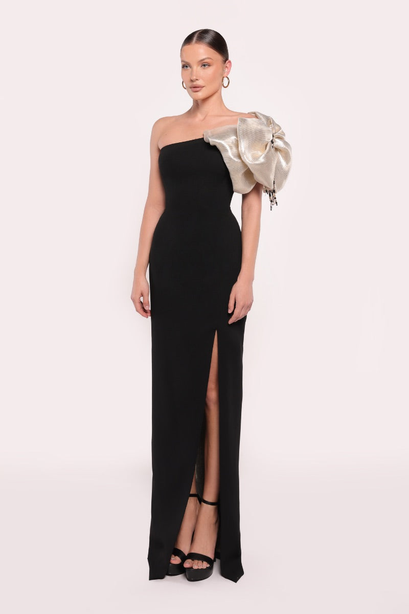 Tarık Ediz black and gold gown, Layla Dress, showing elegant fabric and detailed design on a formal evening gown.