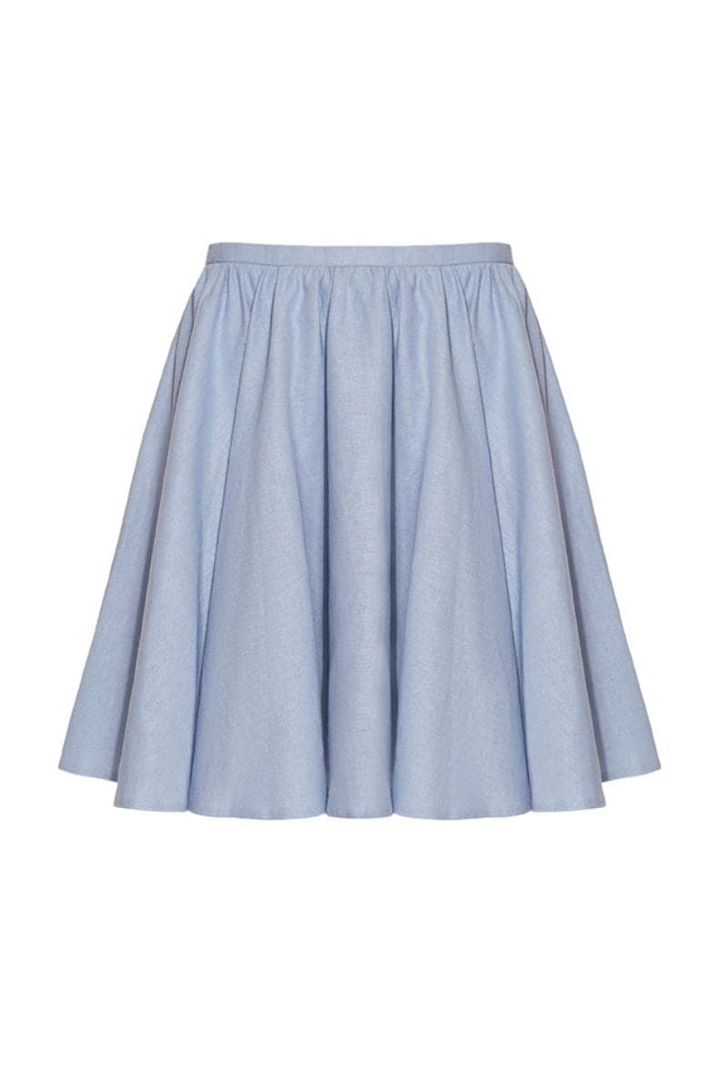 Liya sky blue sweetheart mini skirt with fitted waistband and smooth fabric, styled for a chic, youthful look.