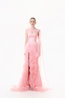Blush pink draped ruffle gown by Happy Clothing featuring flowing fabric and elegant ruffle details.