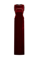 Red Valenciani gown with shoulder cutouts and cape design, elegant evening dress with stylish draping and bold fashion details.