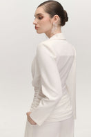 White JEMMIA top by Arti Apparel, featuring a stylish, fitted design perfect for casual or dressy occasions.