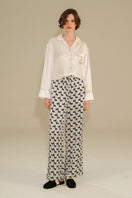 Diamond Poodles contrast silk pajama set from Not Just Pajama, featuring luxurious silk fabric with poodle pattern details.