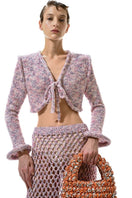 Lalo Sirena pink cardigan, soft knit with long sleeves and button front, styled on a hanger for women’s casual wear.