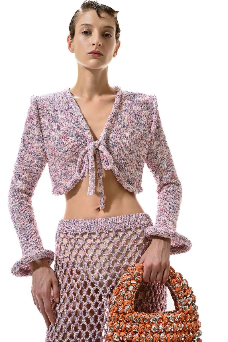 Lalo Sirena pink cardigan, soft knit with long sleeves and button front, styled on a hanger for women’s casual wear.