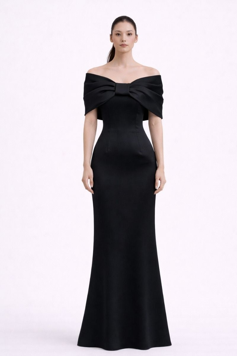 Nihan Peker Ghada black gown featuring elegant fabric and flowing silhouette, perfect for formal occasions.