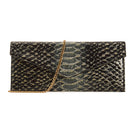 VIKELÉ Studio opera clutch in python with sleek design, showcasing its textured python leather and elegant shape.