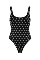 Maliluha black polka dot one-piece swimsuit with a sleek design, featuring a fitted silhouette and stylish straps.