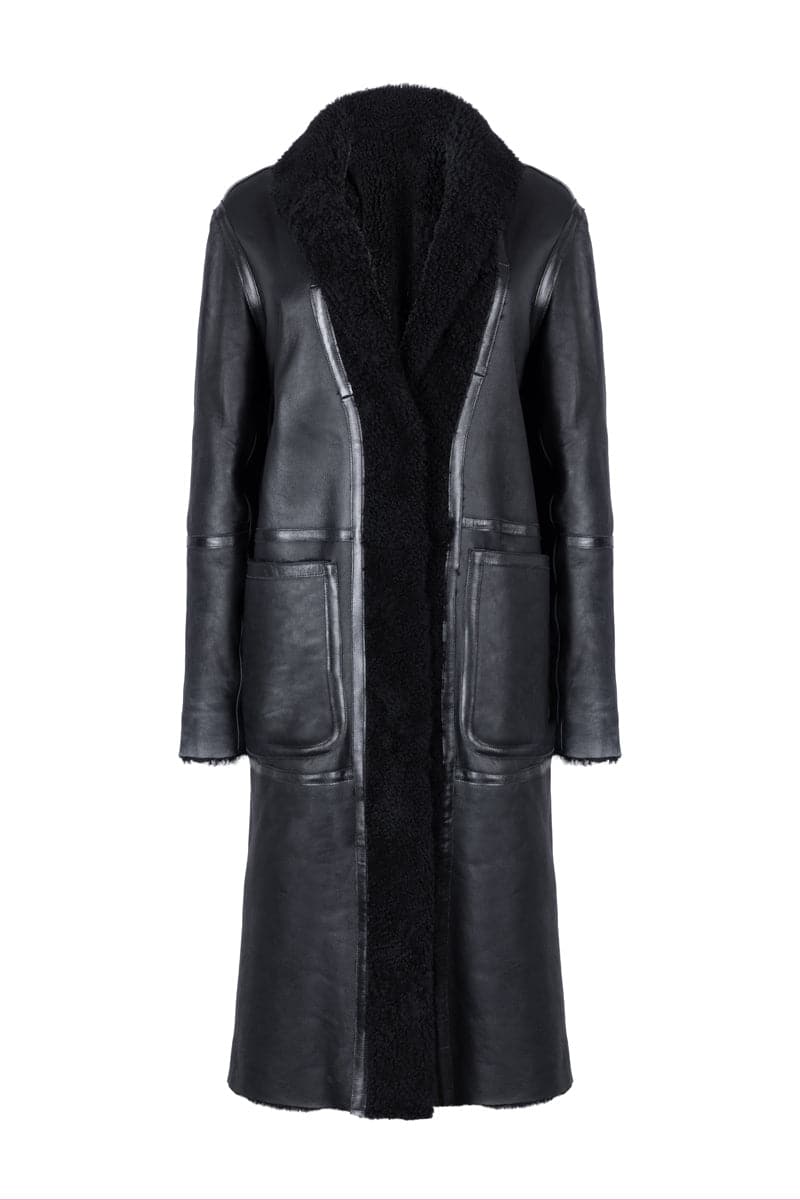 Black Zina biker shearling coat by Verheyen featuring a stylish collar and zipper details, displayed on a hanger.