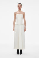Elegant ivory satin midi skirt by Elenareva, flowing design with smooth, shiny fabric perfect for stylish outfits.