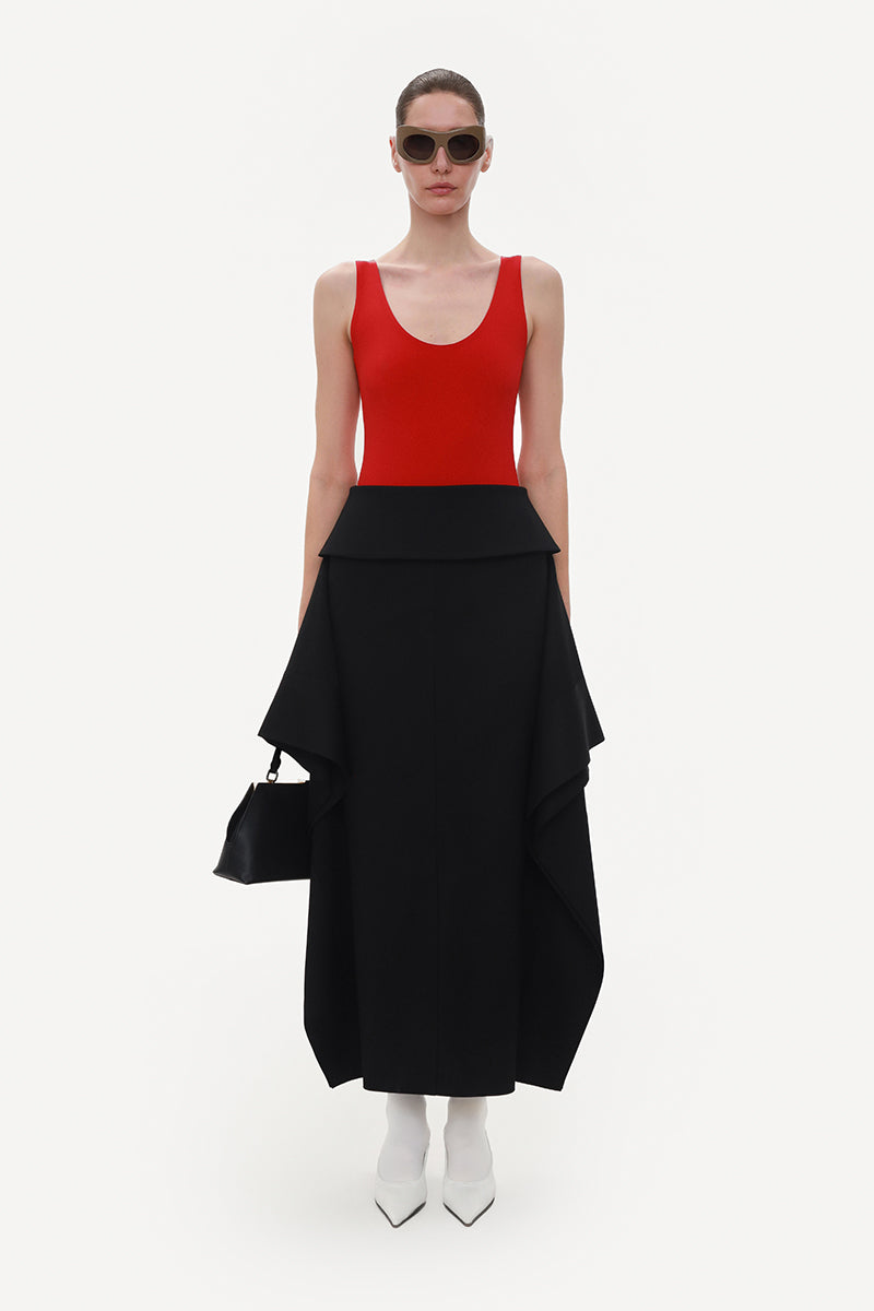 Black wool midi skirt by ELENAREVA, featuring a sleek, tailored design and a mid-length silhouette, perfect for stylish everyday wear.