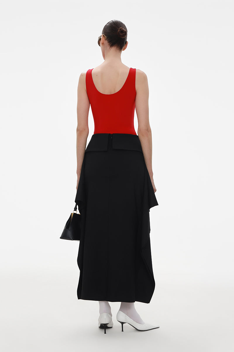 Black wool midi skirt by ELENAREVA, shown with a fitted waist and flowing length, perfect for stylish everyday wear.