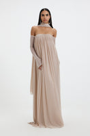 Deme By Gabriella BECKI MAXI DRESS in flowy fabric with a fitted waist and elegant design, shown on a model.