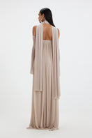Deme By Gabriella Becki Maxi Dress in flowing fabric with a floral pattern, full-length design, and sleeveless style.