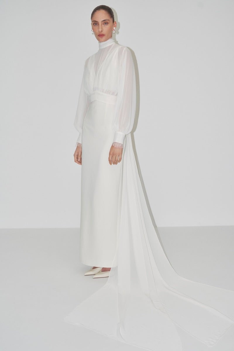 Cropped bridal cape made of Bambula silk by JC Pajares, featuring elegant cover-up design for wedding attire.
