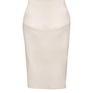 Off-white sculpted midi skirt with pleat details by Kris Marán, showcasing a fitted design and elegant fabric texture.