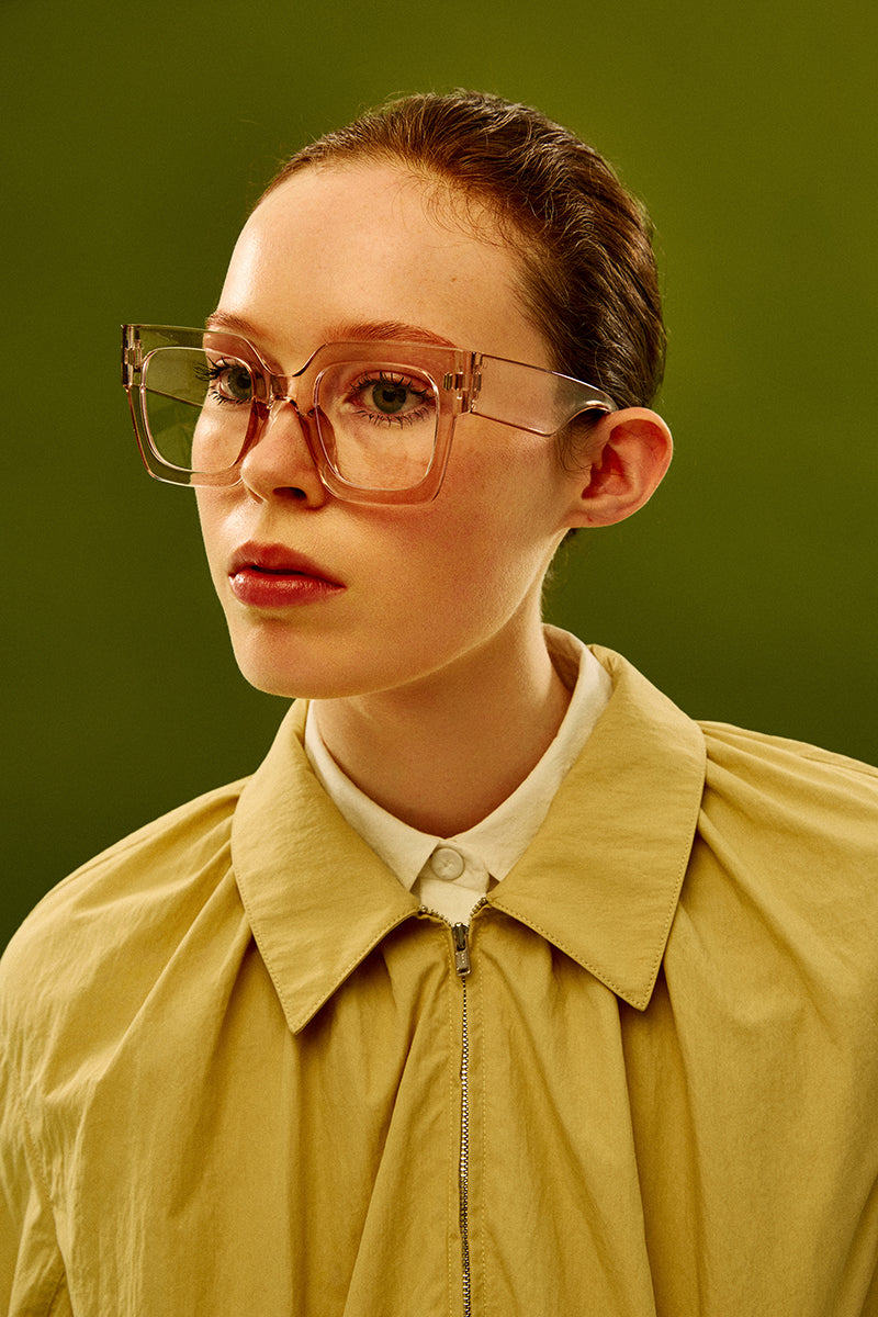 Beige cotton bomber jacket by Chictopia, featuring a stylish fit and classic collar, perfect for casual and trendy outfits.