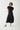 BLACK X-LINE PLEATED MIDI DRESS - CULT MIA