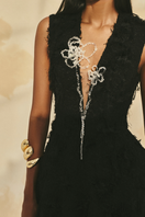 L'SCARLETT sleeveless fringe jacquard V-neck flared gown, showcasing intricate patterns and flowing design.