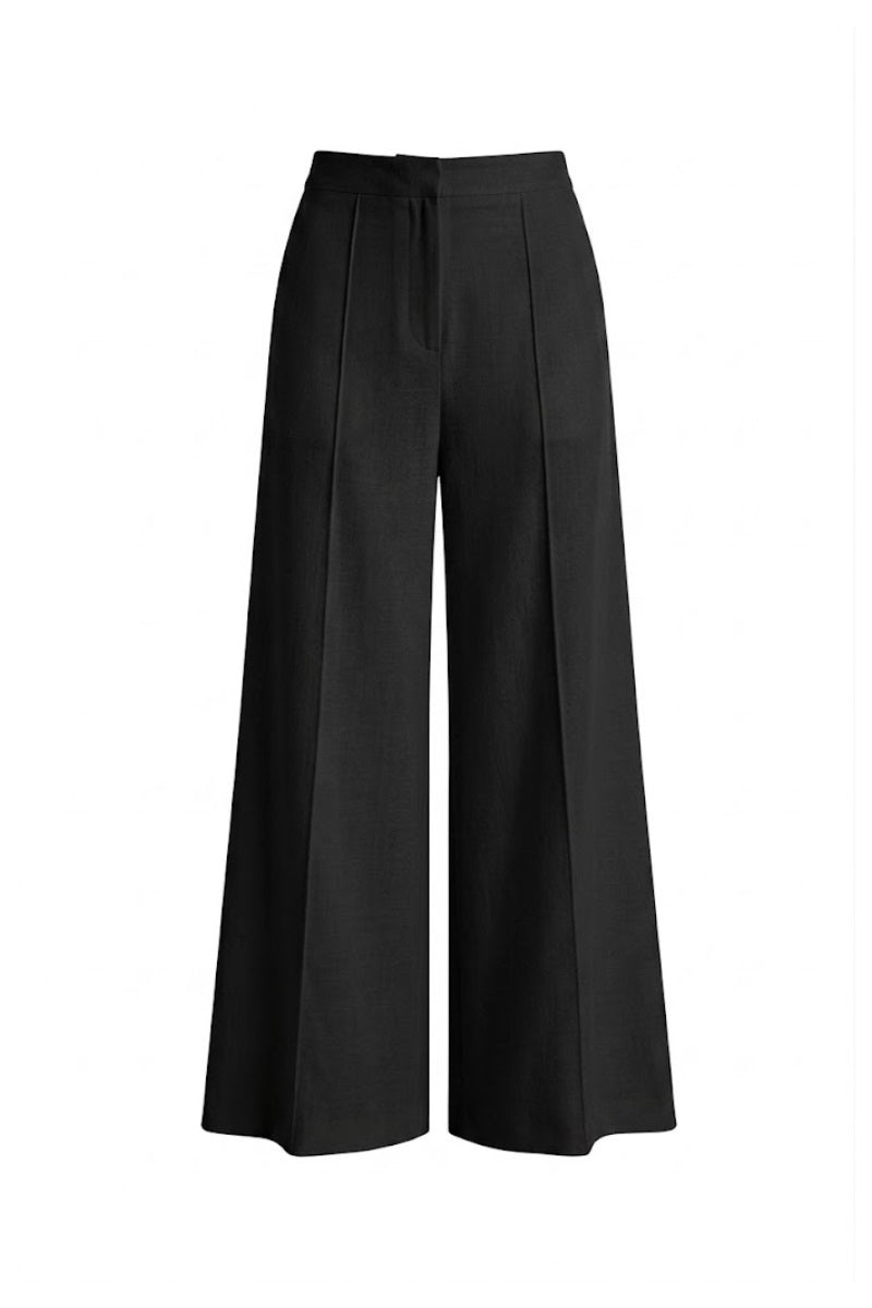 Keira Tong wide leg tweed pants featuring a high waist and relaxed fit in classic tweed fabric.