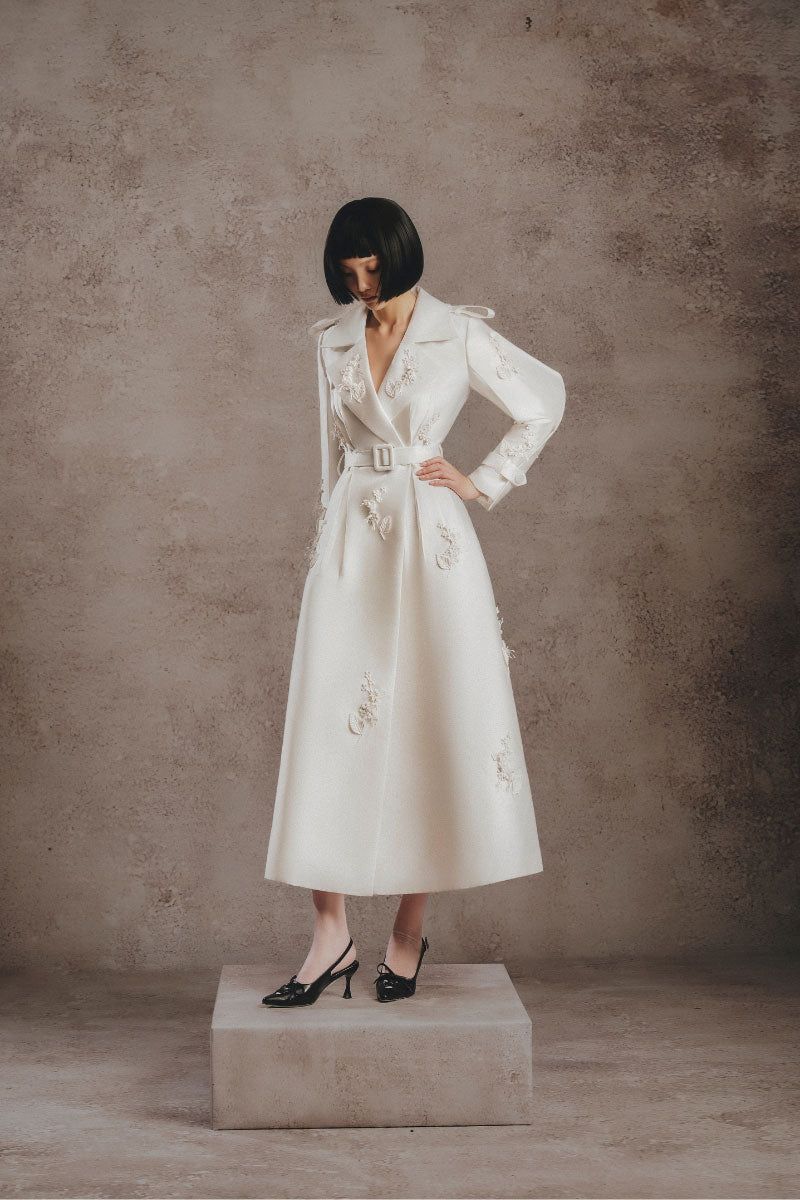 Ivory embroidered trench coat by White Plan, stylish long coat with intricate embroidery, perfect for fashion-forward wear.