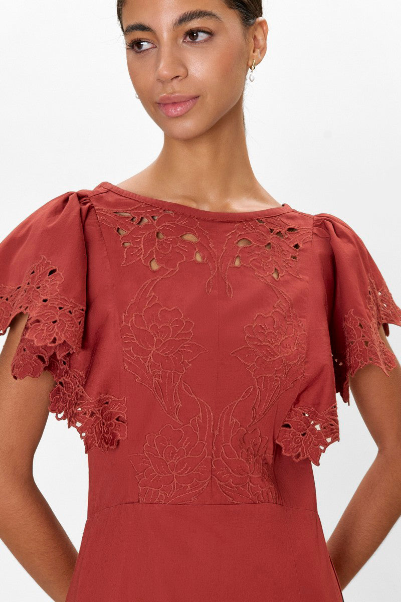 Rebecca Taylor Rachelle midi dress in burnt sienna, featuring a flowy silhouette and stylish design, perfect for elegant occasions.
