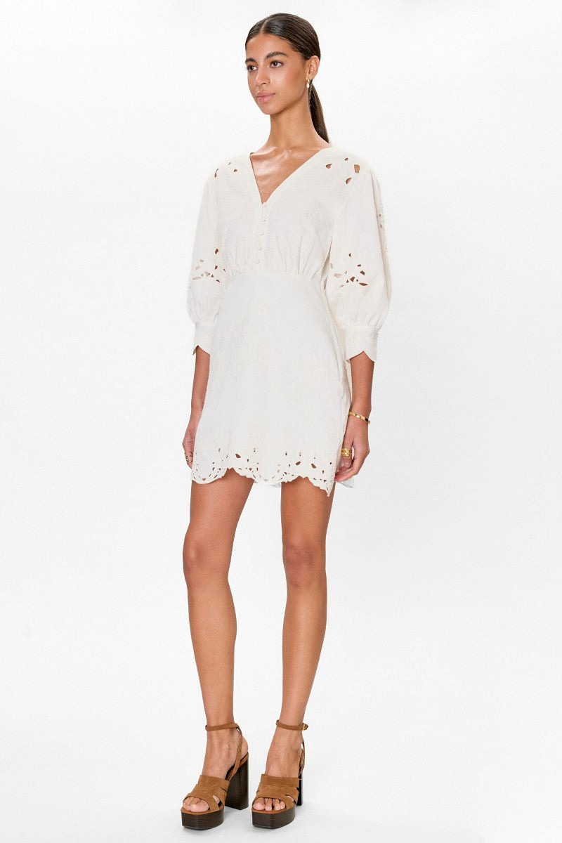 Rebecca Taylor Rachelle button-front ivory mini dress displayed on a hanger with soft fabric details and a subtle background.