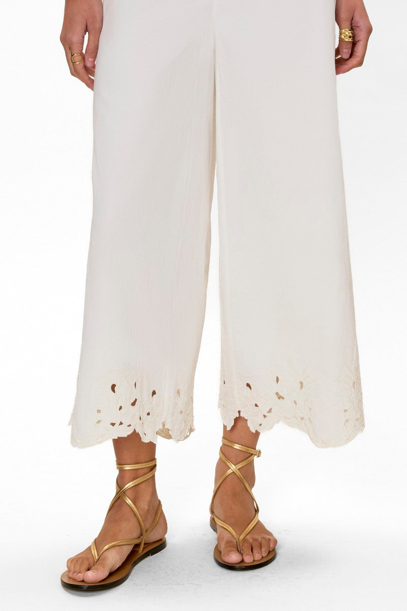 Rebecca Taylor Rachelle Ivory pants with a tailored fit, shown hanging with a smooth fabric and subtle waistband details.