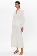 Rebecca Taylor Rachelle popover blouse in ivory, featuring lightweight fabric and relaxed fit, shown on a hanger.