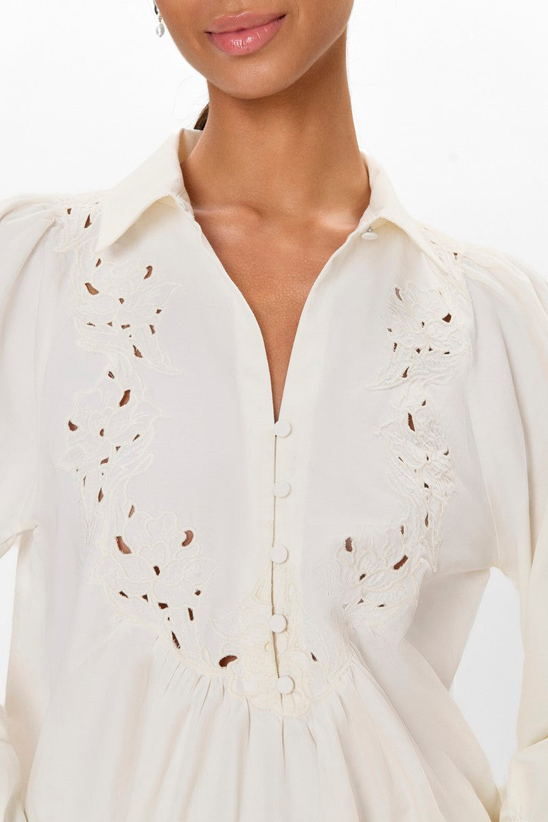 Rebecca Taylor Rachelle pop-over blouse in ivory, stylish women's top with soft fabric and relaxed fit, displayed on a hanger.