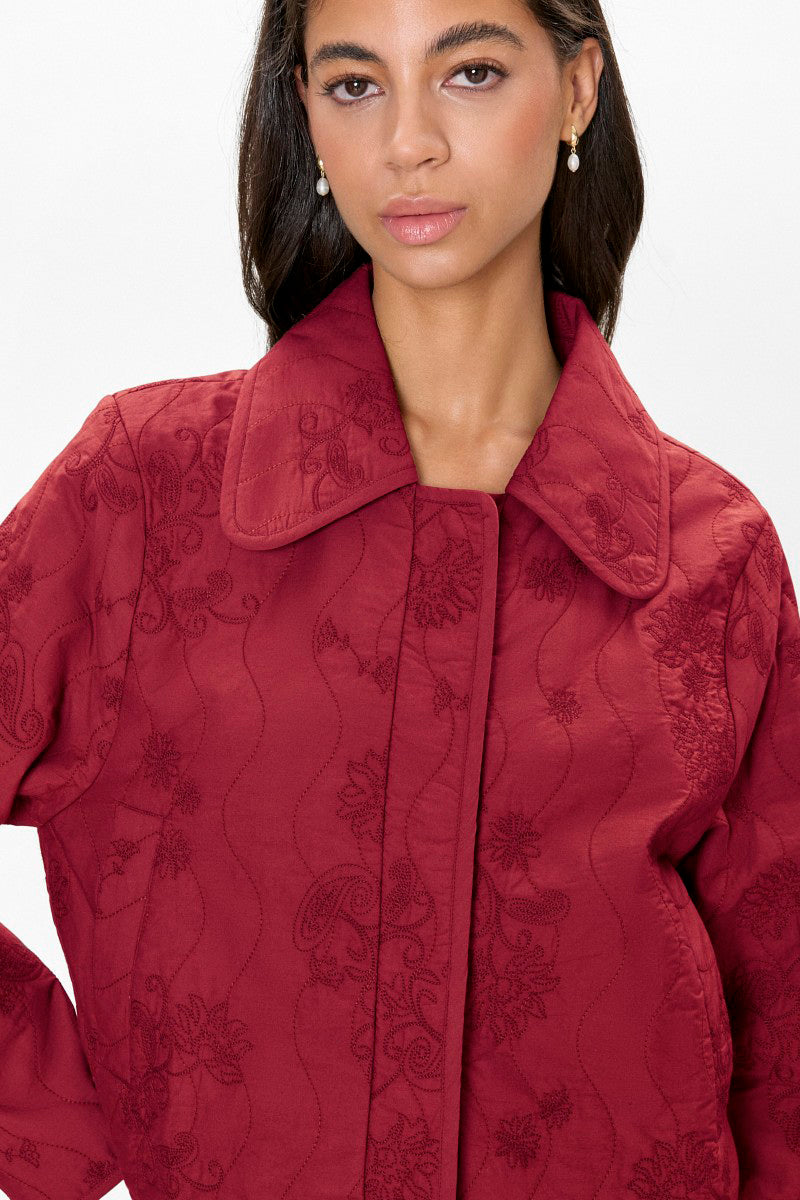 Rebecca Taylor quilted jacket in dark berry color featuring a stylish, padded design and a fitted silhouette.