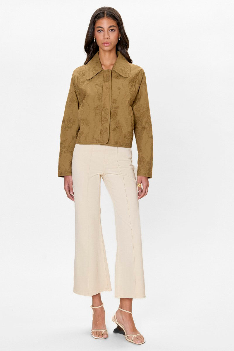 Rebecca Taylor Zuri quilted jacket in leaf green, showcasing a stylish, padded jacket with a quilted pattern and a high collar.