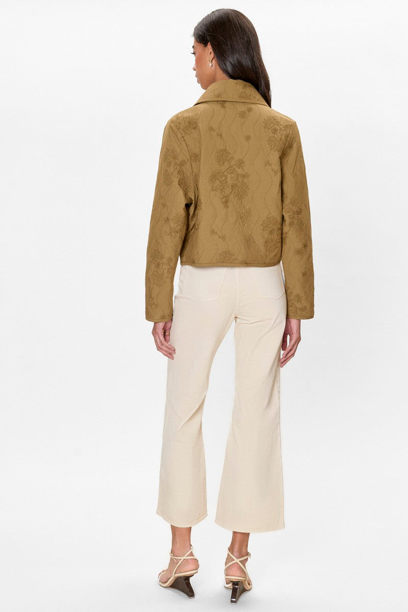 Rebecca Taylor ZURI quilted jacket in leaf green, showing the textured quilted fabric and stylish collar detail.