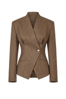 Folded Keira Tong blazer in a stylish design, showcasing the sleek fabric and tailored details of this elegant blazer.