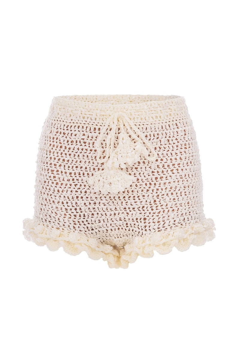 White handmade crochet chrysanthemum shorts by Andreeva featuring intricate floral patterns and a comfortable fit.