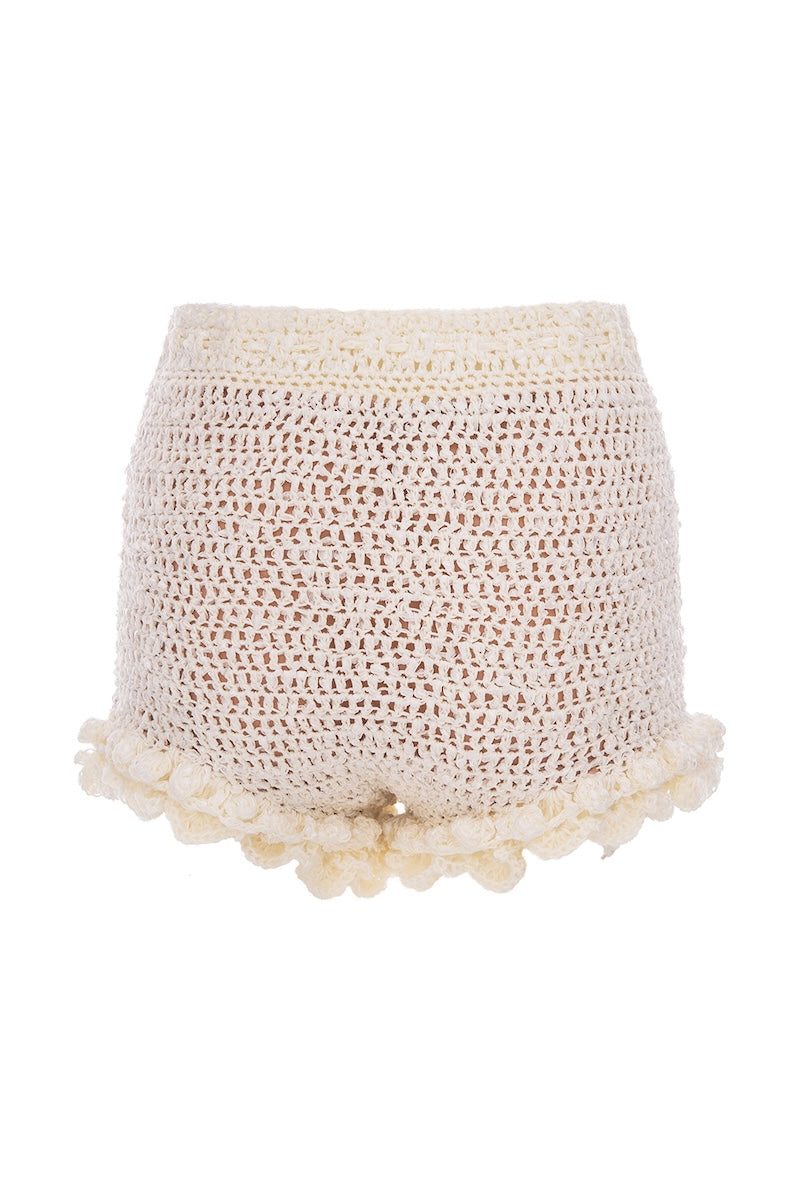 White handmade crochet chrysanthemum shorts by Andreeva, featuring intricate floral detailing and a comfortable fit.