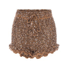 Handmade brown crochet shorts from Andreeva featuring intricate design and short length, perfect for casual or boho style.