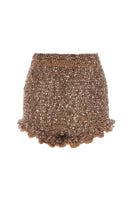 Handmade brown crochet shorts featuring a chrysanthemum pattern by Andreeva, shown on a model.