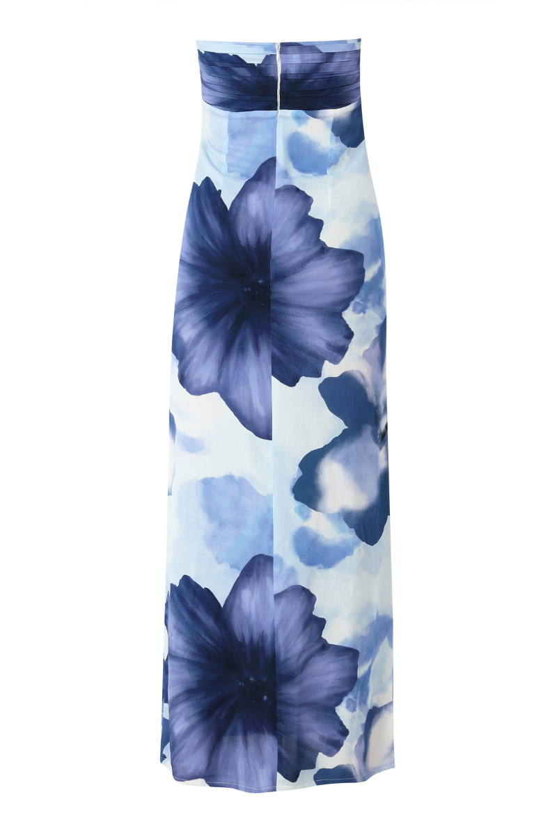 Summer Away COMO Bloom maxi dress featuring a floral pattern and flowing fabric, ideal for casual or summer occasions.