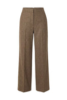 Keira Tong minimal wide-leg pants in neutral fabric, showcasing their relaxed fit and flowing silhouette.