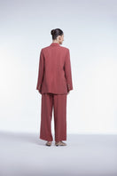 Relaxed single-breasted blazer by Dāl the Label, shown in a stylish, tailored fit with lapel collar and button closure.
