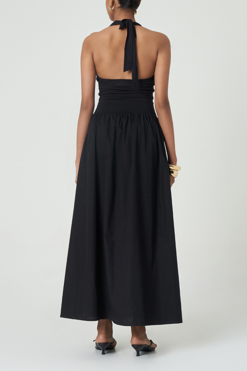 Black Cannes maxi dress by Summer Away featuring a flowing silhouette and elegant design, suitable for stylish summer occasions.