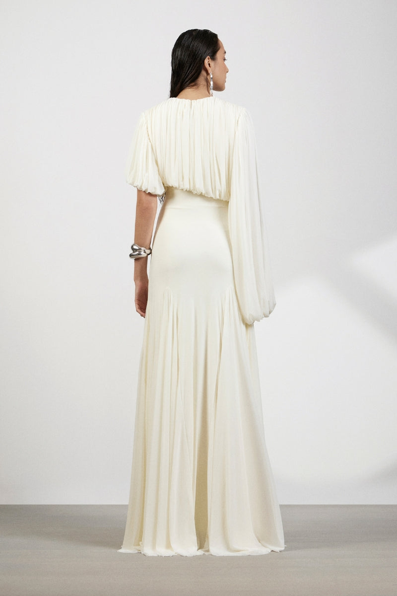 Deme By Gabriella Luna Maxi Dress in flowing fabric with a fitted waist and elegant neckline, perfect for summer occasions.
