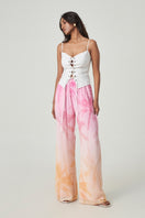 Summer Away LEON pants in Afterglow color, featuring relaxed fit and stylish design, shown on a model.