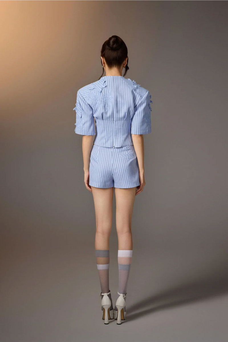 Blue minimal stripe skort from KEIRA TONG, featuring a sleek design and comfortable fit, shown on a neutral background.