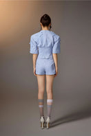 Blue minimal stripe skort by Keira Tong, showcasing a sleek design with subtle stripe pattern and comfortable fit.