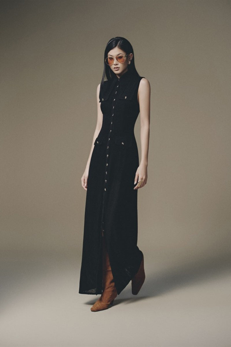 Keira Tong pocket sheer maxi dress shown in a flowing, lightweight fabric with side pockets, perfect for elegant summer wear.