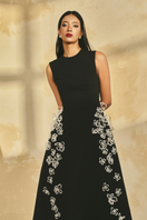 L'SCARLETT sleeveless poly crepe midi flared gown with a fitted bodice and flowing skirt, perfect for elegant occasions.