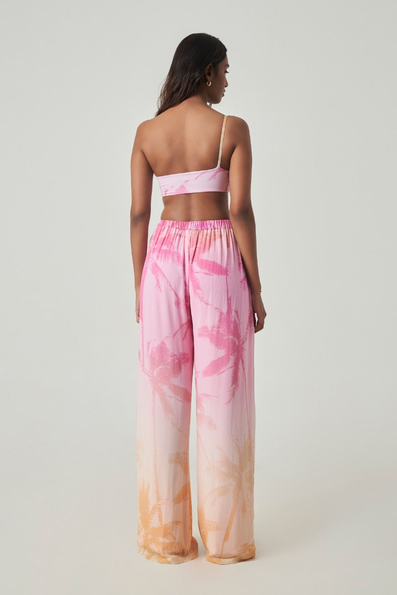 Summer Away LEON Pants in Afterglow color, featuring a relaxed fit and lightweight fabric, stylishly displayed on a model.